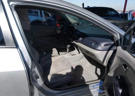 2010 Honda Insight Lx z USA, uszkodzony, nr VIN JHMZE2H55AS031608